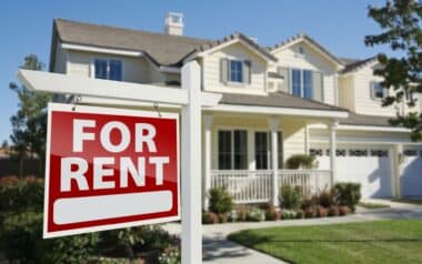 ATO For Rent Real Estate Sign in Front of House