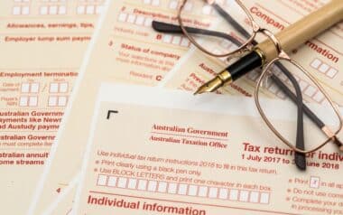 Australian tax declaration and pen on wooden table