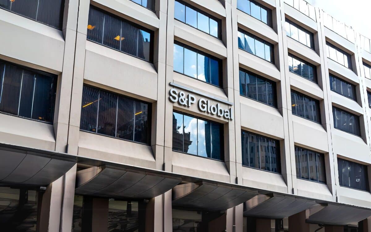 The facade of a modern office building prominently displaying the S&P Global logo