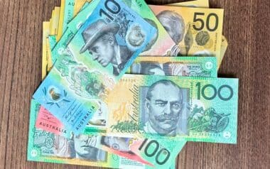 Australian Currency on Wooden Background