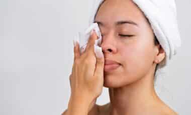 Woman wiping her face