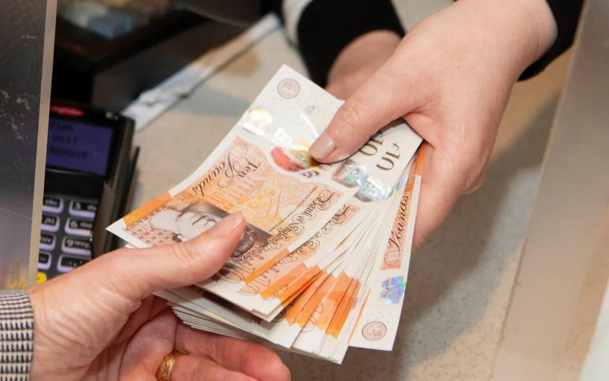 Child Trust Fund-a close-up of two hands engaged in a transaction