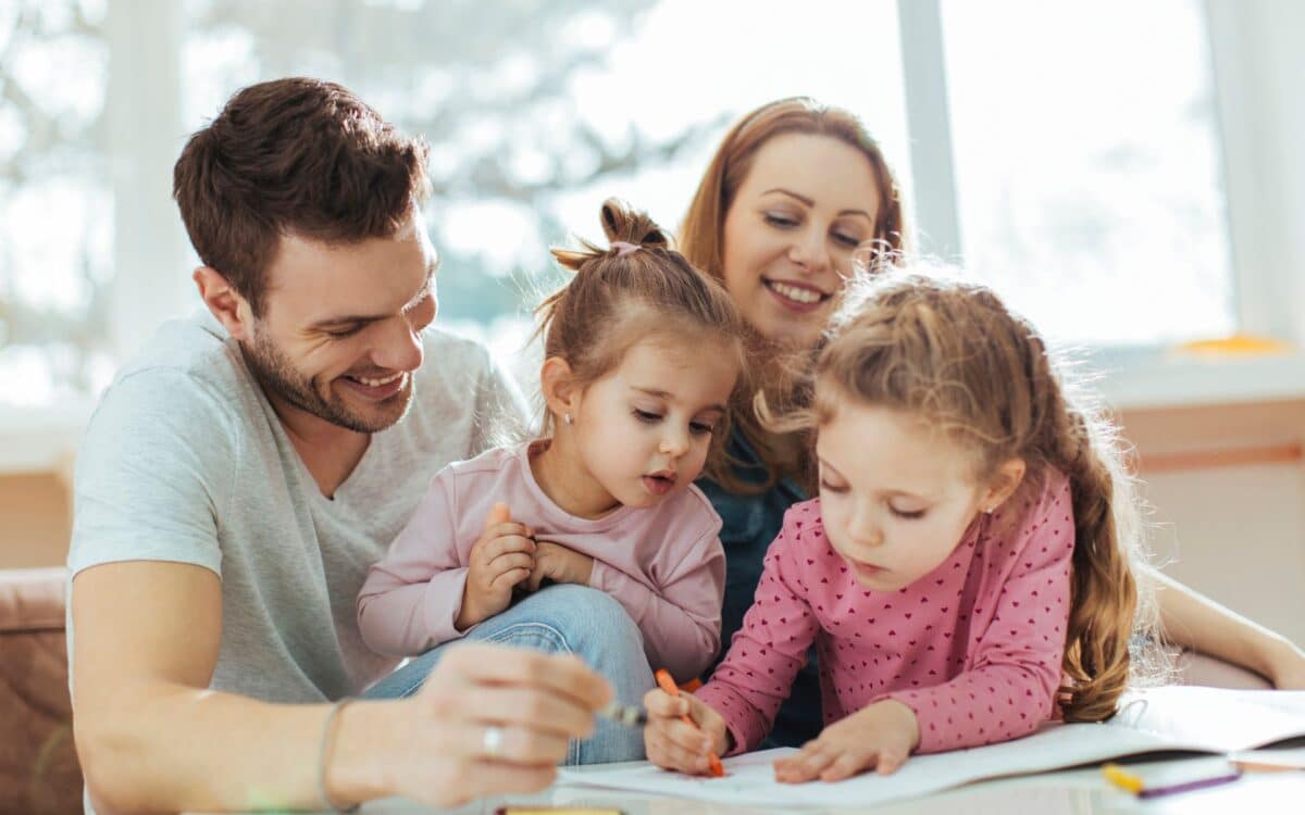 Child playing with parents Childcare benefit