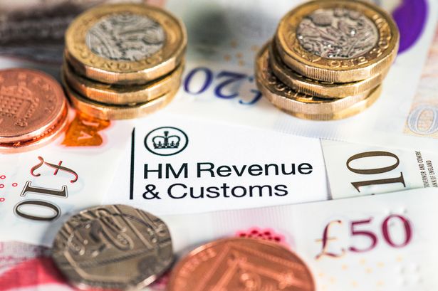 HMRC logo surrounded by British pound notes and coins