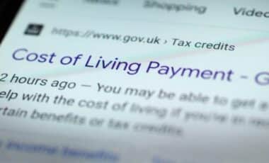 A Blurred Screenshot of a UK Government Webpage Titled "Cost of Living Payment"