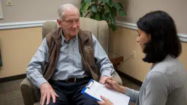 An elderly man taking PIP assessement