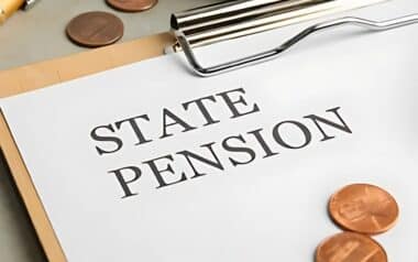 Document with the words STATE PENSION prominently displayed in large, bold letters.