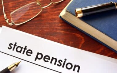 Paper with title state pension on a table.