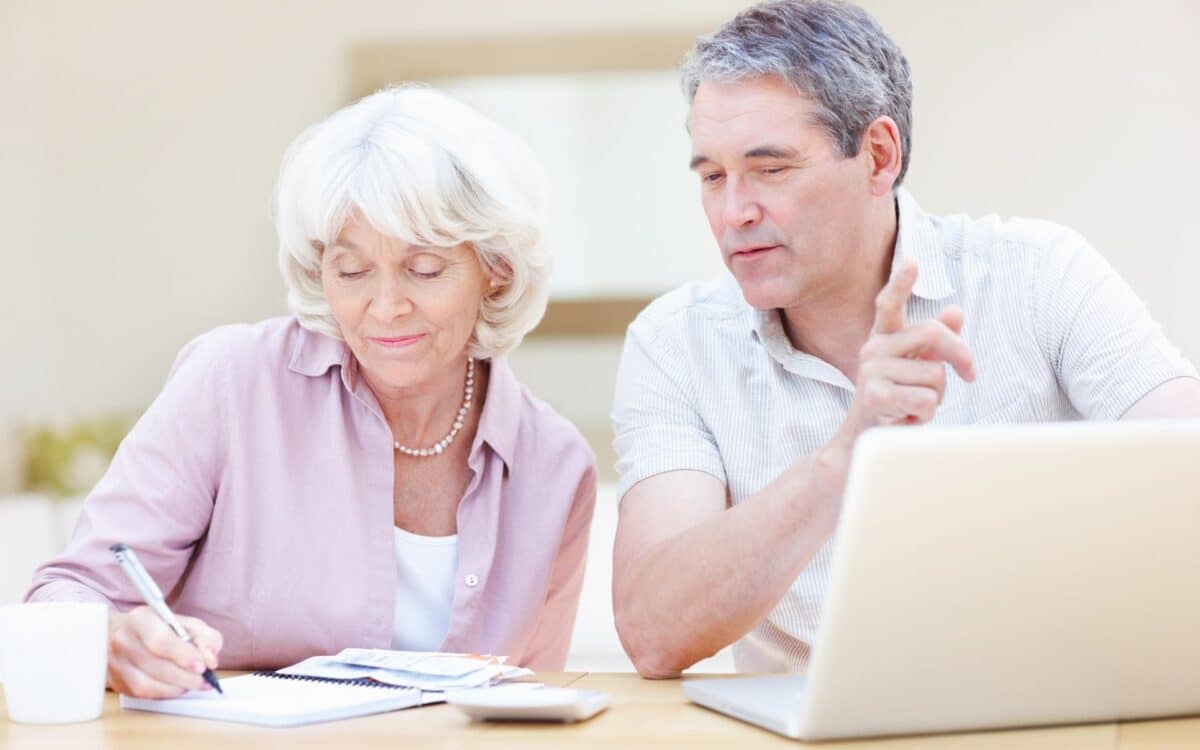 Pensioners Couple doing Retirement paperwork