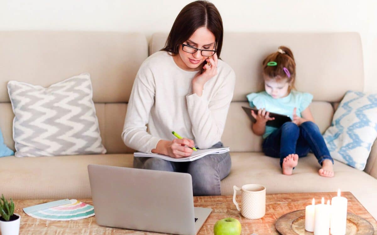 Young Mother Working from Home an applying for Household Support Fund