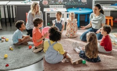 Childcare Providers Playing with Children