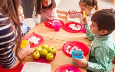 Group of Children Eating at the Daycare