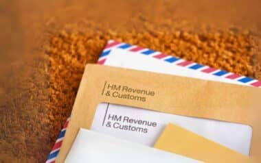 an envelope with the HM Revenue & Customs ( HMRC ) logo on it,