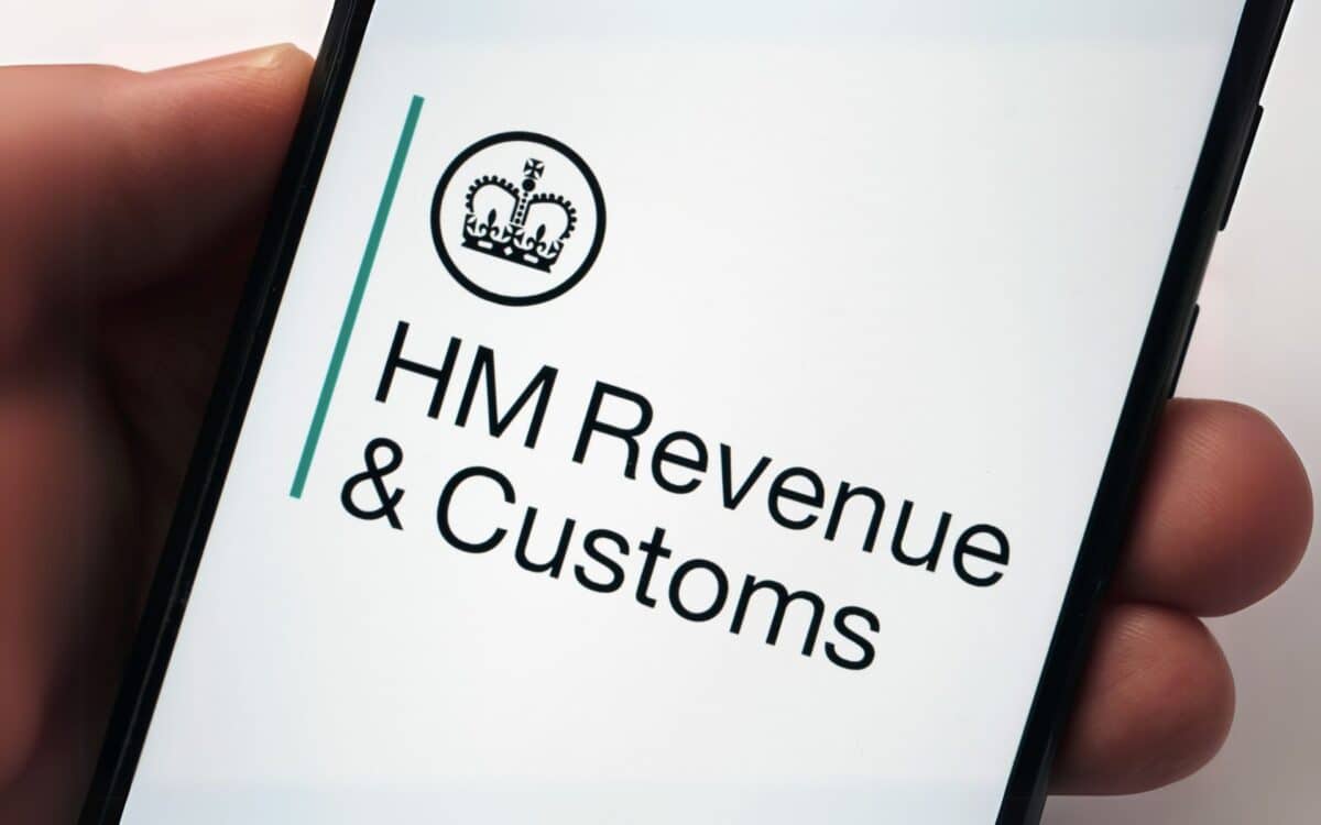 a smartphone screen displaying the official HM Revenue & Customs (HMRC) logo