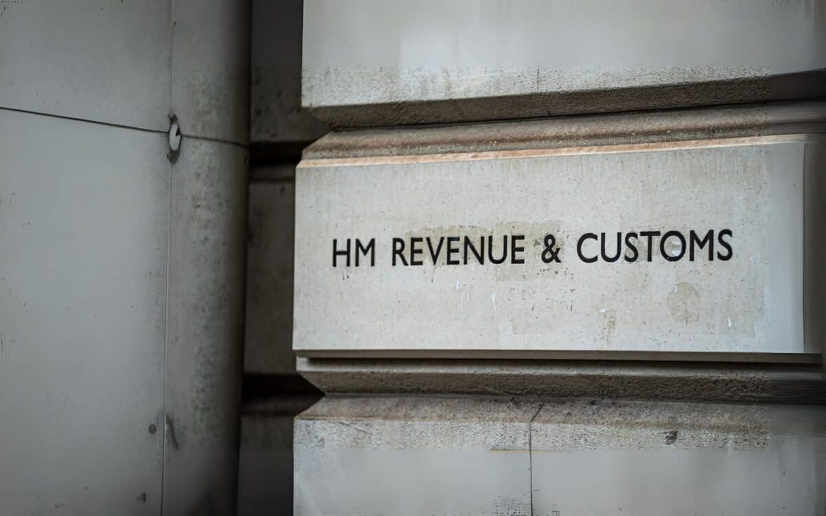 stone wall with bold black letters reading HM Revenue & Customs ( HMRC )