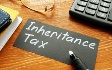 Desk setup with Inheritance Tax written on card