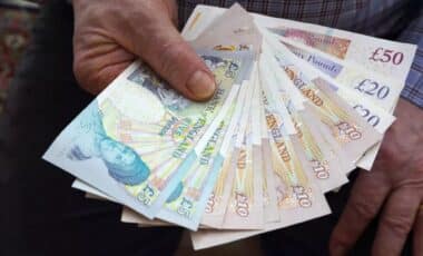 Hand Holding UK Bank Notes (Image: Getty Images)
