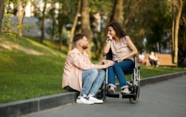 Couple with Wheelchair in Park, Disabled Woman