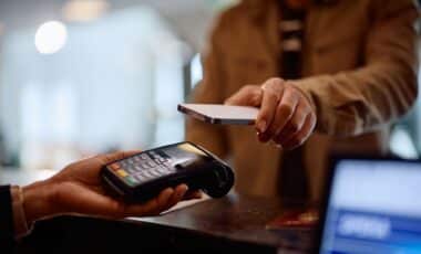 Person using smartphone to pay