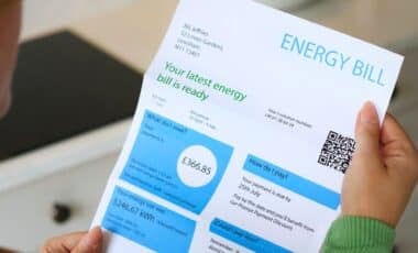 Close up of Woman Opening UK Energy Bill