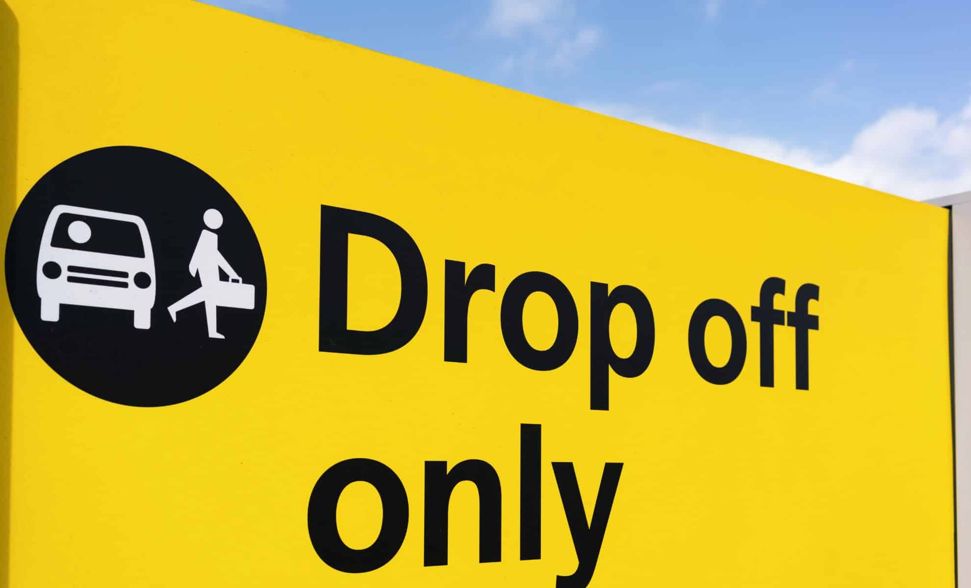 Drop off only airport sign