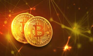 Two Bitcoin Coins - Gold color, gilded background