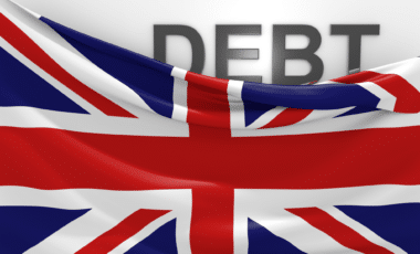 UK Flag Uncovering Word "Debt"