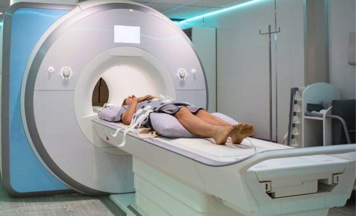 A Patient Positioned Over An Mri Scanner