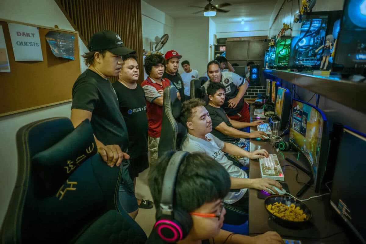 Joniel Bo (left) In An Online Café Specialising In Cryptographic Games