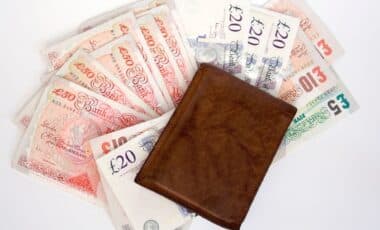 Wallet Full of UK Banknotes Symbolizing the upcoming UK Bank Boost