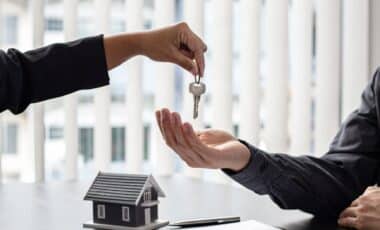 Landlord Handing House Key to Tenant