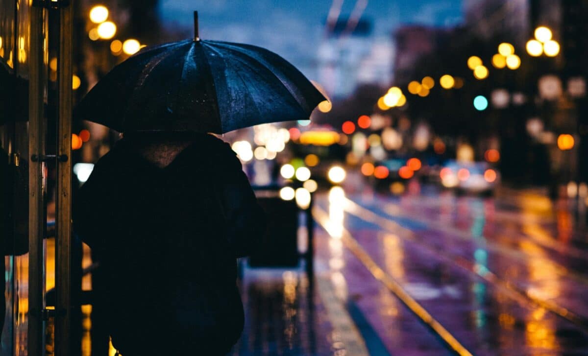 Uk Weather Person Holding Umbrella