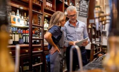 Business Owner Talking To His Employee At A Bar