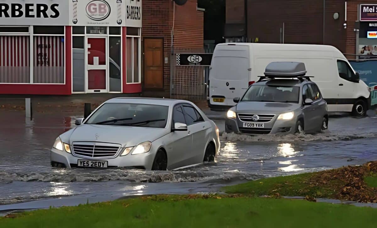 Weather - Vehicles Drive Through Floodwaters In Perry Bar, Birmingham