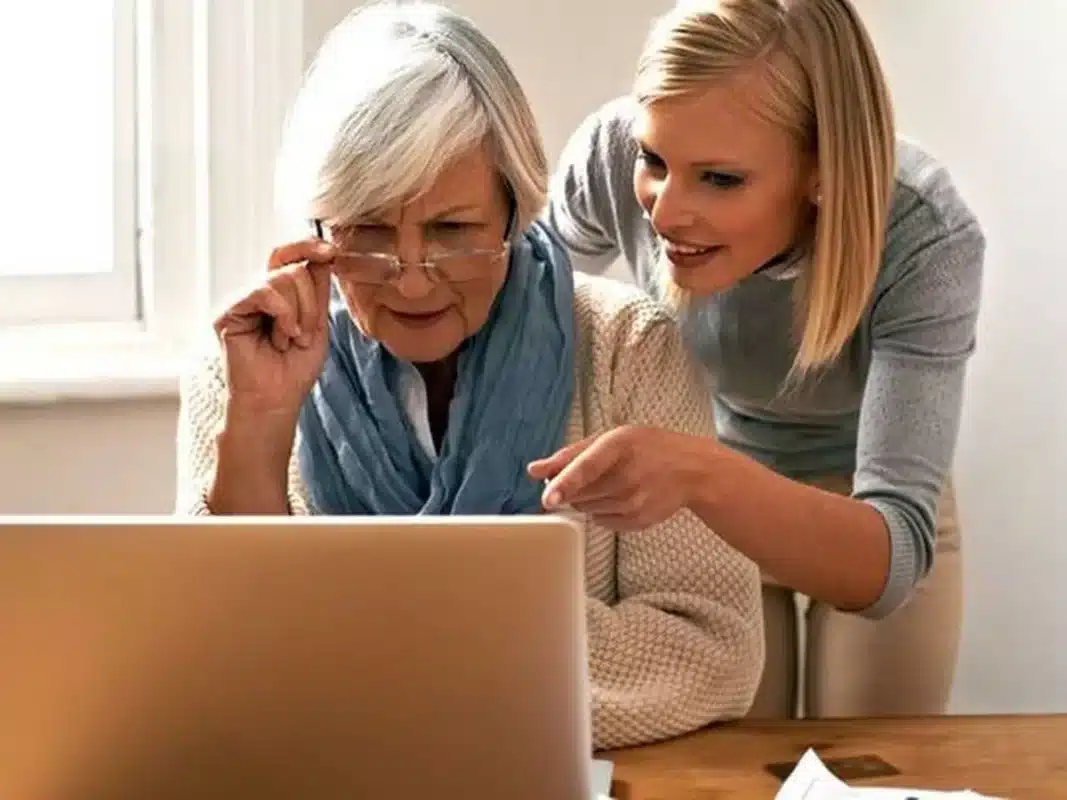 Old Women Getting Help From Her Granddaughter