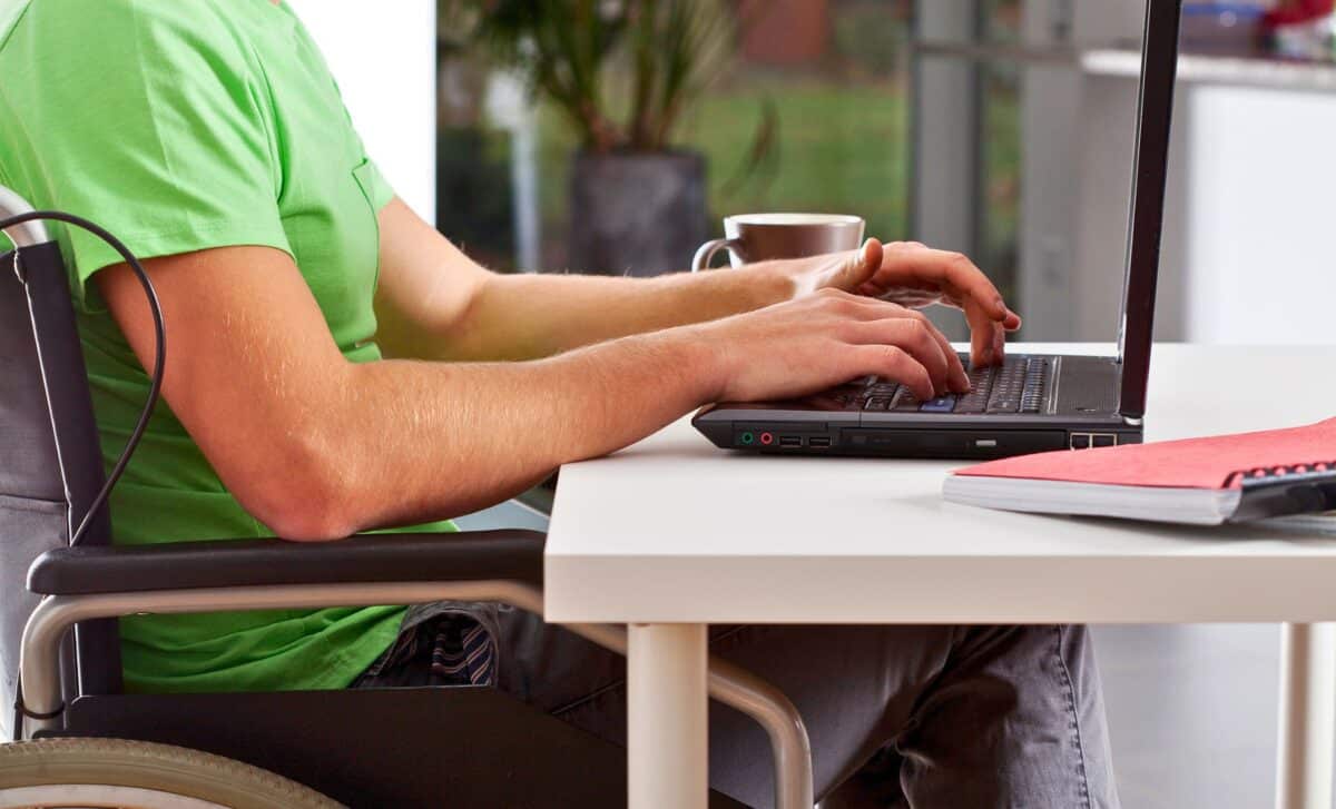 Disabled Man Using An Internet Tool