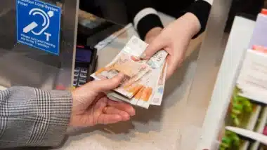 Interest rates, a person receive-cash-at-the-post-office