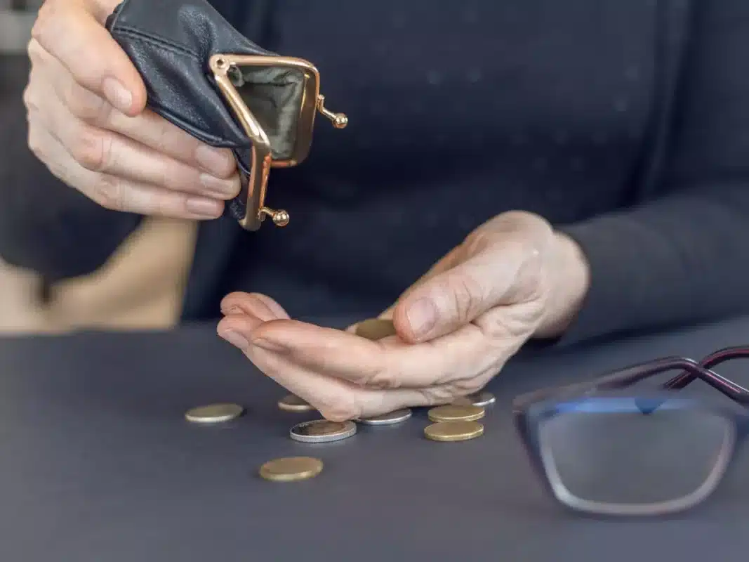 DWP-Pensioner Sorting Out Coins