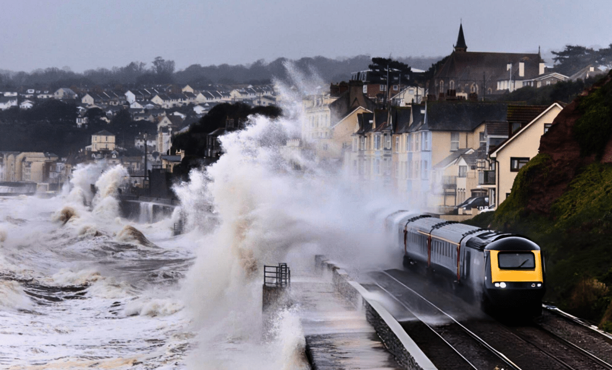 Storm Darragh — Intercity Train, Leaving Dawlish Station And Getting A Soaking From Storm Waves