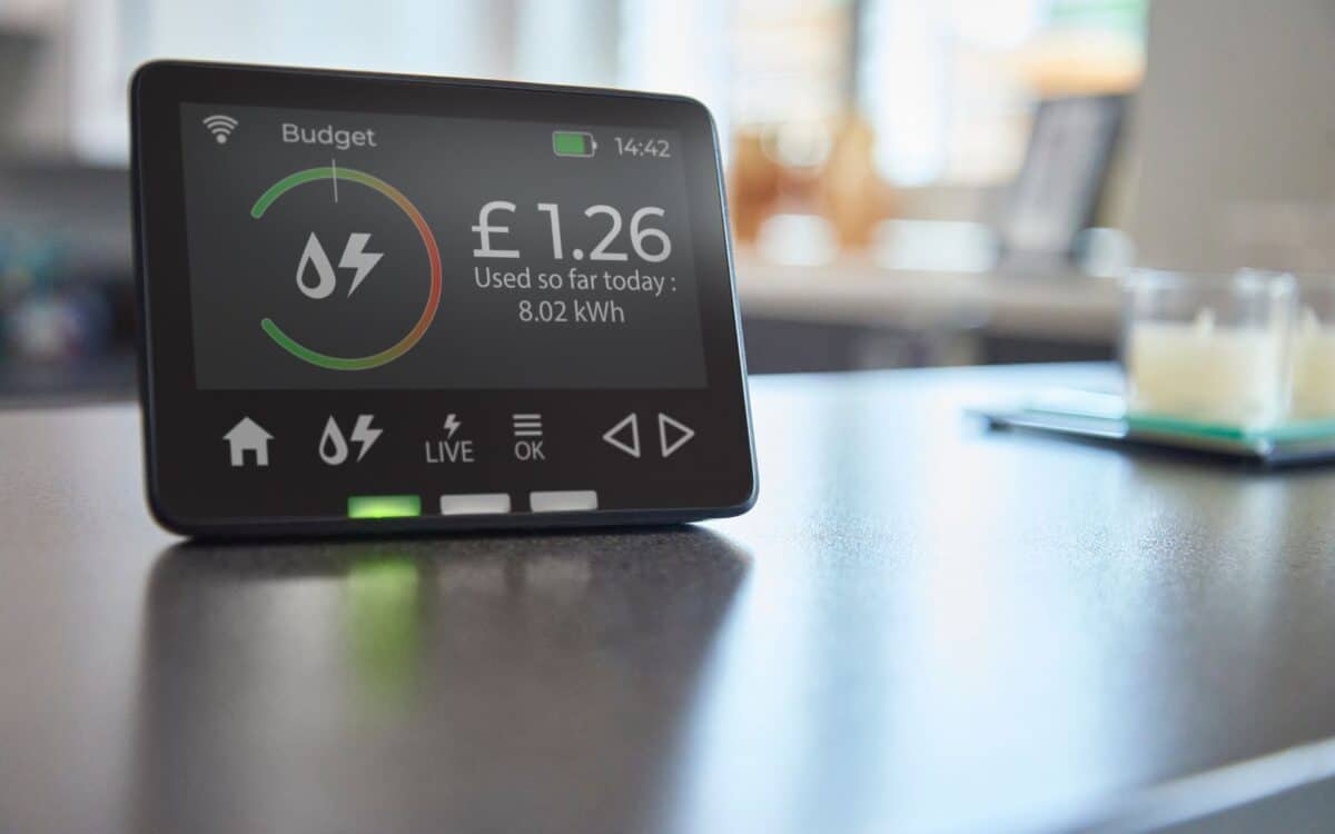 Smart Energy Meter Displaying Real-Time Electricity Usage and Cost in a Modern Home