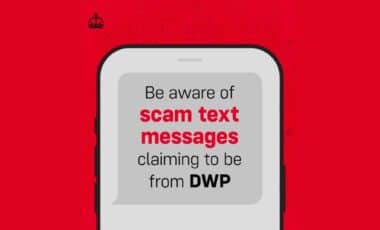 Warning Message On A Red Background Centred On A Stylized Depiction Of A Smarthphone That Reads Be Aware Of Scam Text Claiming To Be From DWP