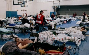 Los Angeles-shelter set up in a gymnasium, where evacuees affected by an emergency, likely wildfires, are staying temporarily