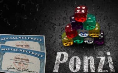 U.S. Social Security cards and a pyramid of colourful dice with 'Ponzi' written beneath