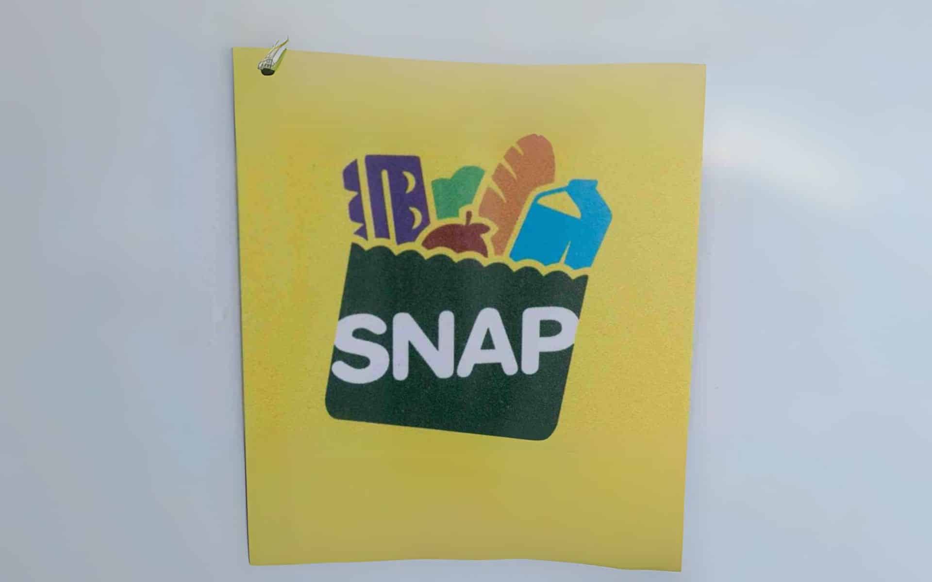 SNAP (Supplemental Nutrition Assistance Program) logo on a yellow background