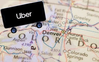A map of Colorado with a miniature vehicle displaying the Uber logo