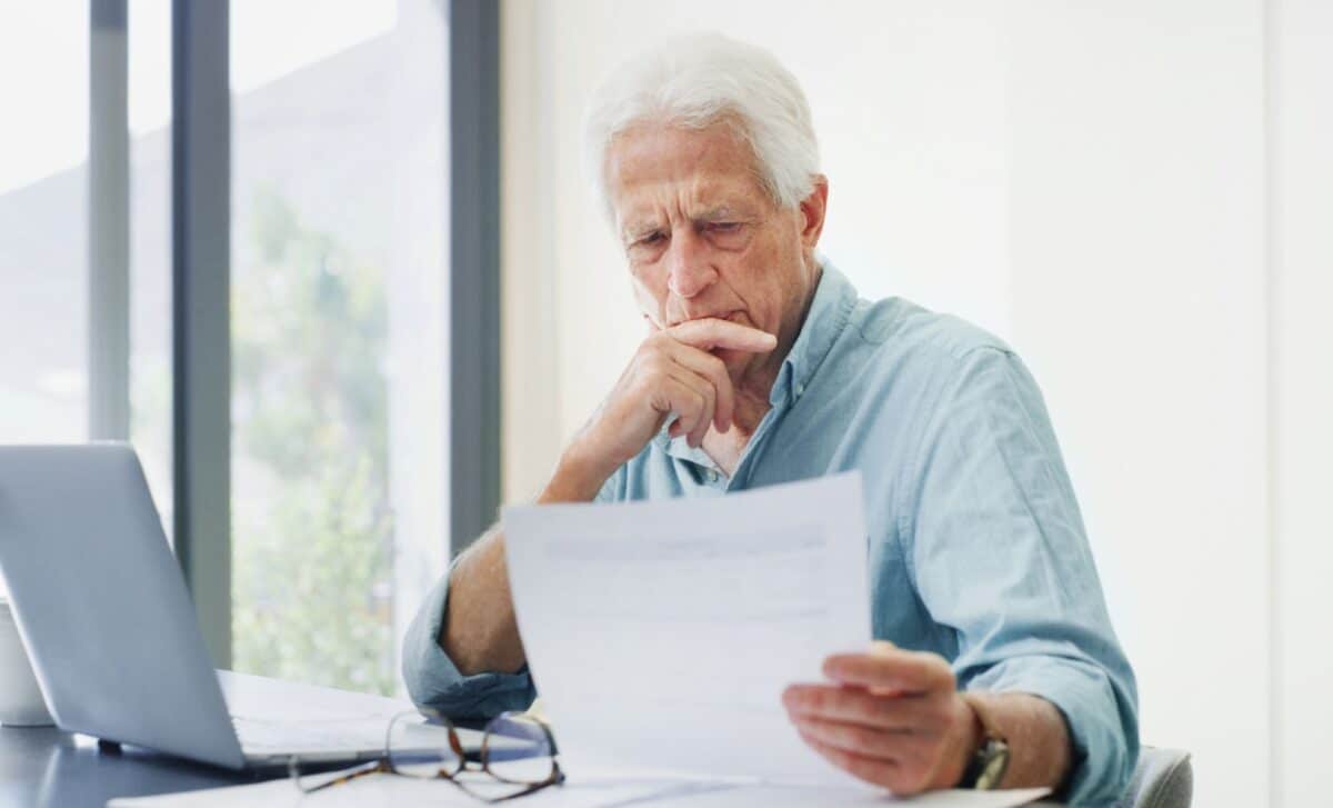 Post-retirement investing shifts from growth to income, balancing bonds for short-term stability and stocks for long-term needs while aligning strategy with personal risk preferences