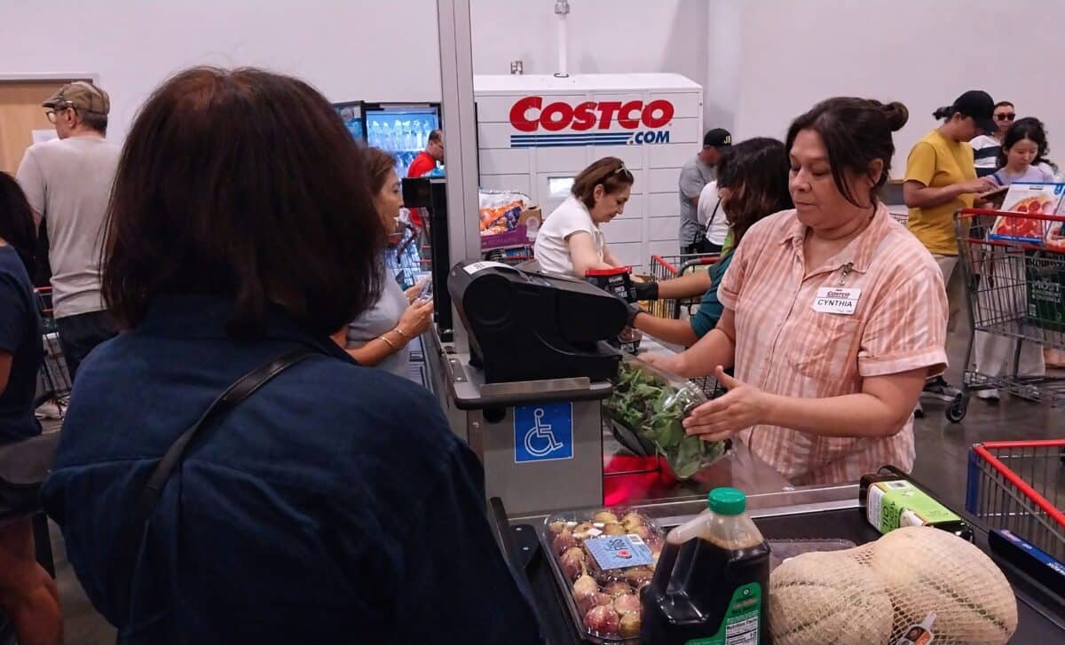 Costco cashier and customer at the checkout line