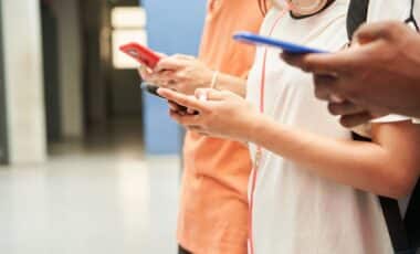 Students holding cell phones